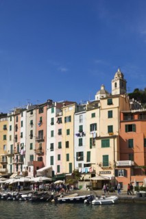Harbour with small boats and colourful apartment building facades at Portovenere, La Spezia