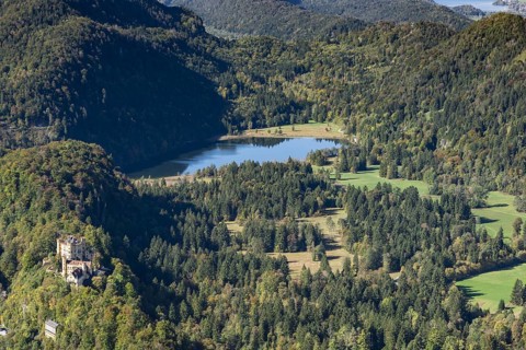 Hohenschwangau Castle and Schwansee in autumn, Romantic Road, Ostallgaeu, Allgaeu, Bavaria,