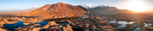 Aerial view, high mountain landscape with glacial moraines and mountain lakes, behind Pik Lenin,