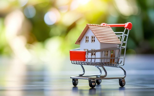 Real estate shopping concept, a house is a shopping cart on blurred bokeh background, AI generated