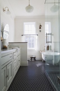 White antique style finish vanity with quartz countertop and two sunken sinks, freestanding claw