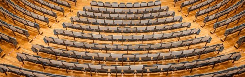 View from above into an empty lecture theatre with rows of seats, interior view, Department of