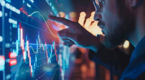 A man is pointing at a graph on a transparent screen showing market and economy trends, AI