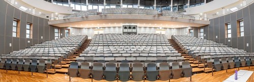 Panorama, view from the lectern to rows of seats in an empty lecture theatre, interior view,
