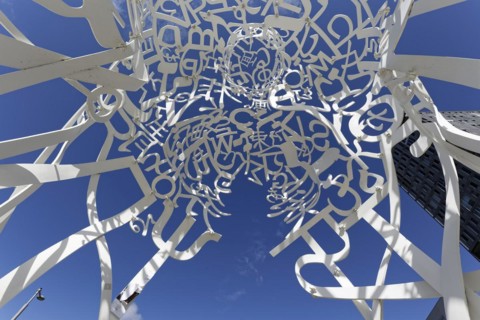 Public art, frog perspective of source sculpture by Jaume Plensa, Montreal, Province of Quebec,