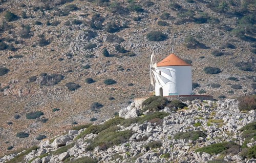 Old windmill on a rock, Beech of Panormitis, Symi, Dodecanese, Greece, Europe