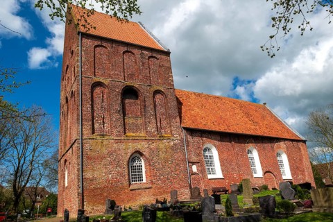 Protestant Reformed Church in Suurhusen, famous leaning church tower, municipality of Hinte,