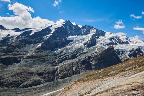 View from Wasserfallwinkelkeesee into the mountains (Grossglockner) with Pasterze on a sunny day,