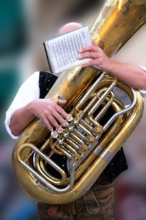 Tuba players in traditional traditional costume, lederhosen, at the spring festival in Deggendorf,