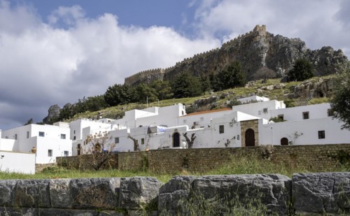 View of the Acropolis and the white houses of Lindos, Rhodes, Dodecanese archipelago, Greek