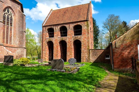 Protestant Reformed Church in Suurhusen, famous leaning church tower, municipality of Hinte,