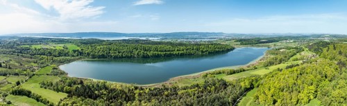 Aerial view of Lake Mindelsee, a glacier tongue lake on the Bodanrueck, on the horizon on the far