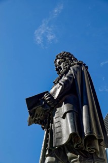 Inner courtyard of Leipzig University with the monument to Gottfried Wilhelm Leibniz, Leipzig,