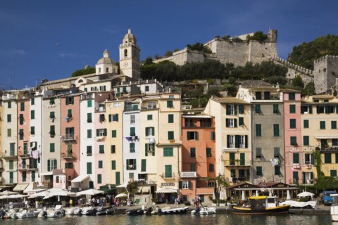 Harbour with fishing boats and colourful apartment building facades at Portovenere, La Spezia