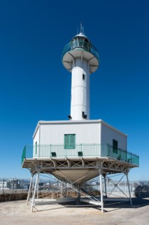 Far de la Banva lighthouse on the Moll de Llevant promenade, a 4.5 km long promenade for joggers,