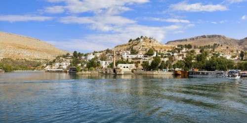 Partly submerged mosque of Eski Halfeti due to the construction of the Birecik dam on the Euphrates