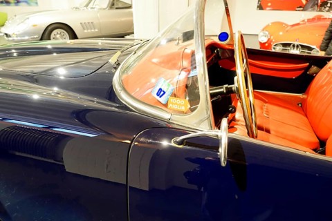 LANCIA AURELIA B24 SPIDER, Interior view of a classic car with red leather and view of the cockpit