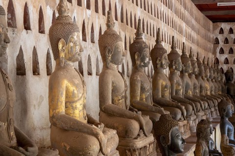 Ancient Buddha statues in the courtyard of Wat Si Saket, Vientiane, Vientiane province, Laos, Asia