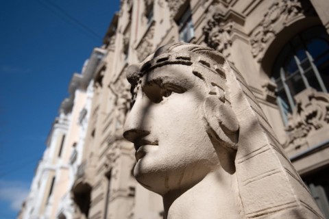 Sphinx in front of Art Nouveau building in Alberta iela in Riga, street is a UNESCO World Heritage