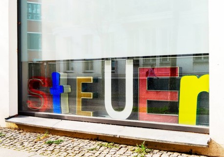 Advertising on the shop window of a tax office, Berlin, Germany, Europe