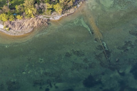 Flight in a zeppelin along the shore of Lake Constance, sewage pipe, aerial view, Immenstaad,