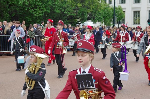 A marching band with young people on the streets, folklore, bank holidays 17 May, Norwegian flag,