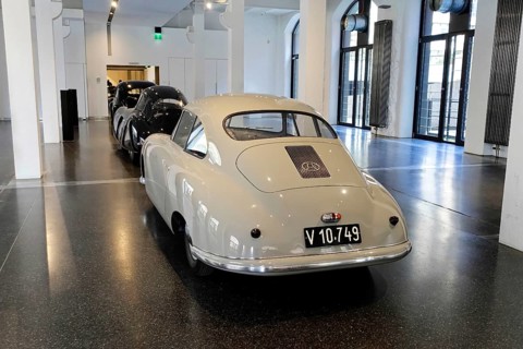 Rear view of a grey Porsche 356 Coupe in an exhibition hall, AUTOMUSEUM PROTOTYP, Hamburg,