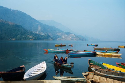 Schoolgirls going to school, juvenile, boating, lake Phewa, Pokhara, Nepal, Asia