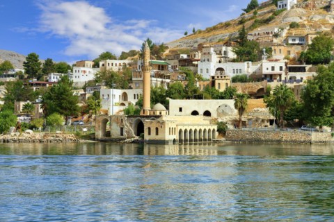 Partly submerged mosque of Eski Halfeti due to the construction of the Birecik dam on the Euphrates