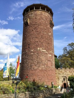 View of large high castle tower of the legendary 13th century fairytale castle Fairytale castle of