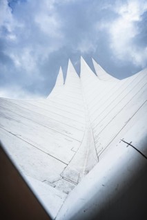 View of a futuristic-looking white tent roof against the sky, Tempodrom, Berlin, Germany, Europe