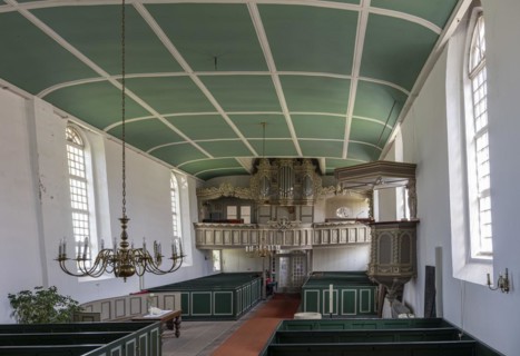 Protestant Reformed Church from 1401, interior with pews, pulpit and organ, Greetsiel, Krummhoern,