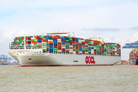 OOCL Zeebrugge container ship leaving quayside departing from Port of Felixstowe, Suffolk, England,