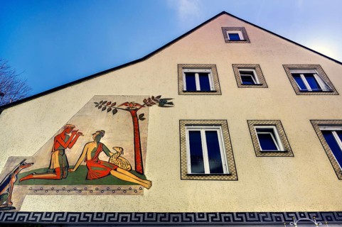 Facade with fresco, shepherd with flute and shepherdess with lamb, Kaufbeuern, Allgaeu, Swabia,