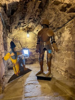 Medieval knight's armour on display inside the 13th century castle tower, Trendelburg,