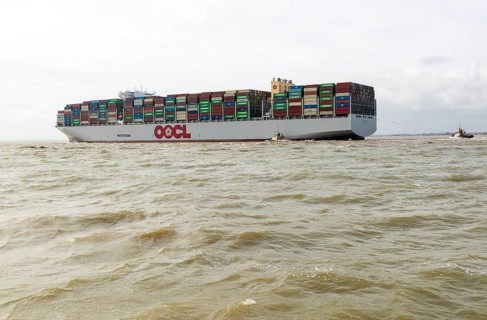 OOCL Zeebrugge container ship leaving departing from Port of Felixstowe, Suffolk, England, UK