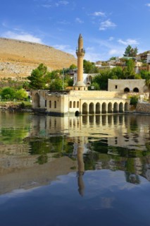 Partly submerged mosque of Eski Halfeti due to the construction of the Birecik dam on the Euphrates