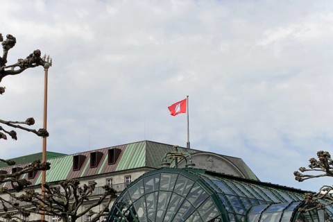 Hamburg City Hall and City Hall Market, Hamburg, Germany, Europe, Red flag flies on a building with