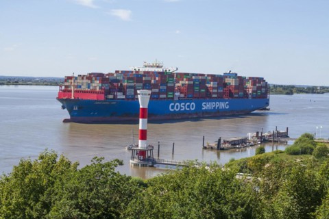 Cosco container ship and lighthouse on the Elbe, Blankenese district, Hamburg, Germany, Europe