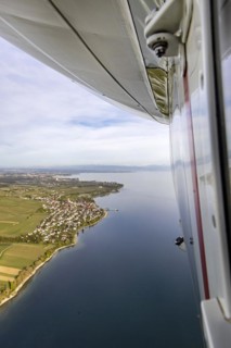 Flight in a zeppelin along the shore of Lake Constance, aerial view, Hagnau, Baden-Wuerttemberg,
