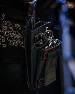Hair scissors in a hairdresser's belt bag, taken in the hairdressing salon Coiffeur Sivan in