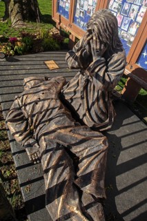Chicago, Illinois, A bronze sculpture called Thou Shalt Not Kill shows Jesus Christ weeping over a