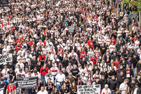 Protest march in front of the southern summit. Around 10, 000 VfB fans march to the stadium in