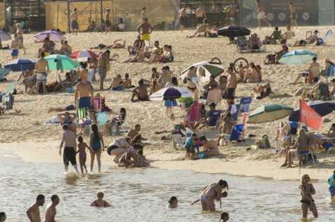Montevideo, Uruguay, 11th January 2022, Beautiful sunset on Pocitos beach with bathers on a summer