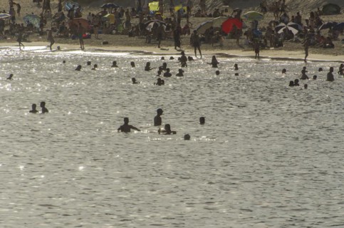 Montevideo, Uruguay, 11th January 2022, Beautiful sunset on Pocitos beach with bathers on a summer