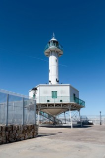 Far de la Banva lighthouse on the Moll de Llevant promenade, a 4.5 km long promenade for joggers,