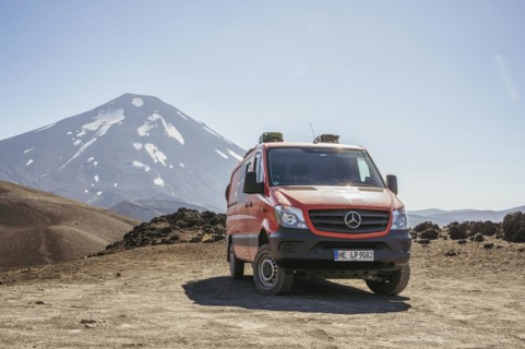 Campervan in front of the Lonquimay volcano, Lonquimay volcano, Malalcahuello National Reserve,
