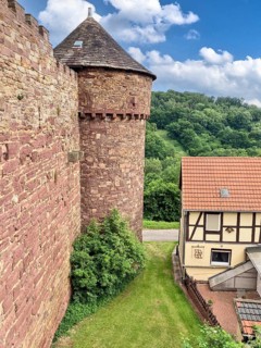 View of corner defence tower with shingles covered watchtower defence tower of medieval Trendelburg
