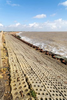 Coastal defences North Sea coast at East Lane, Bawdsey, Suffolk, England, UK sheet piling inclined