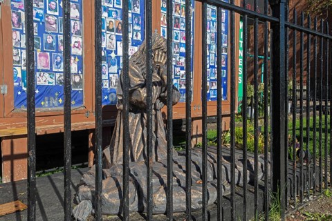 Chicago, Illinois, A bronze sculpture called Thou Shalt Not Kill shows Jesus Christ weeping over a